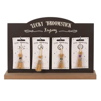Set of 24 Lucky Broomstick Keyrings on Display